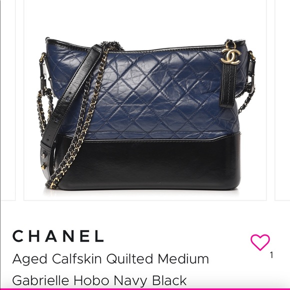 Chanel purse. Hobo bag in navy. Like new. - Picture 1 of 5